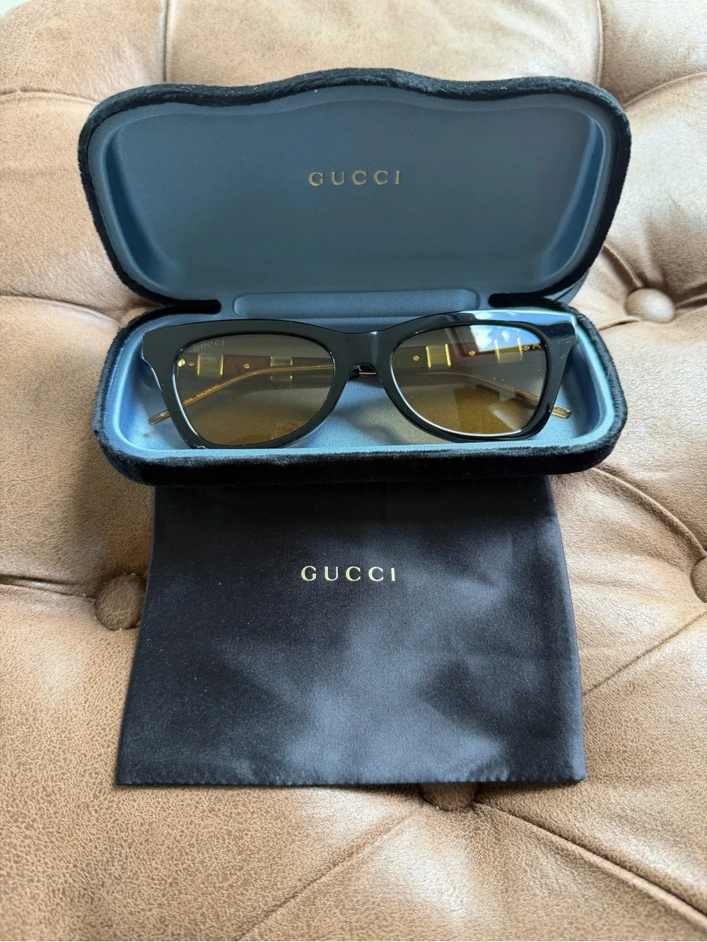 Gucci Black Frame Sunglasses with Amber Lenses